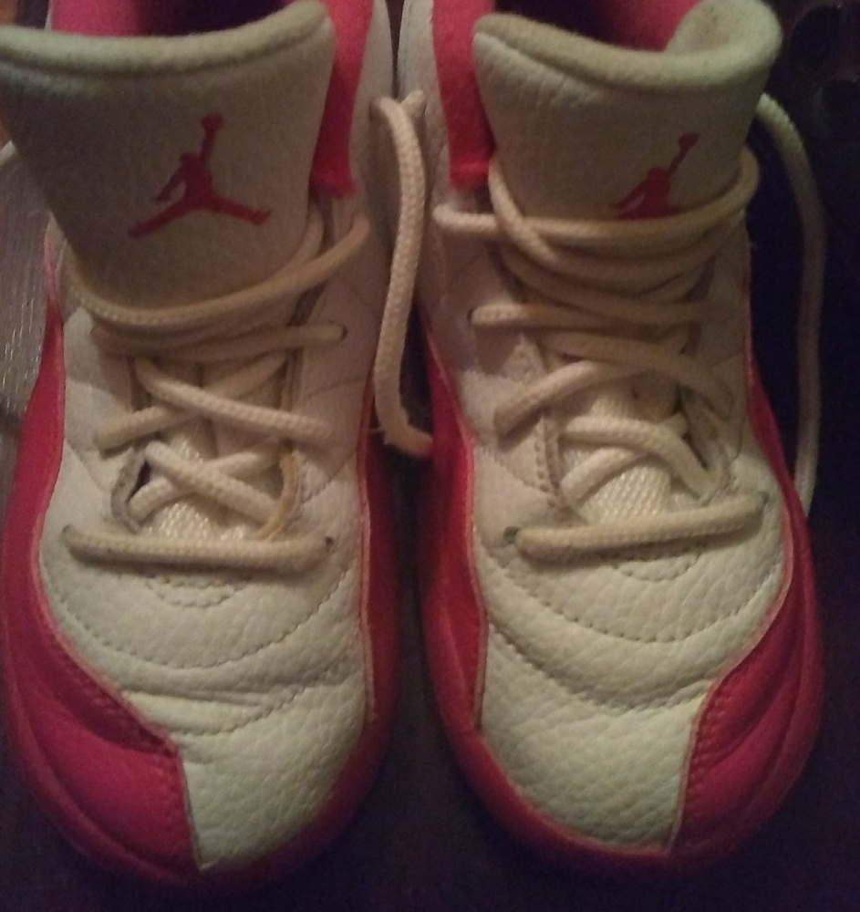 Pink and white Toddler Jordan's.